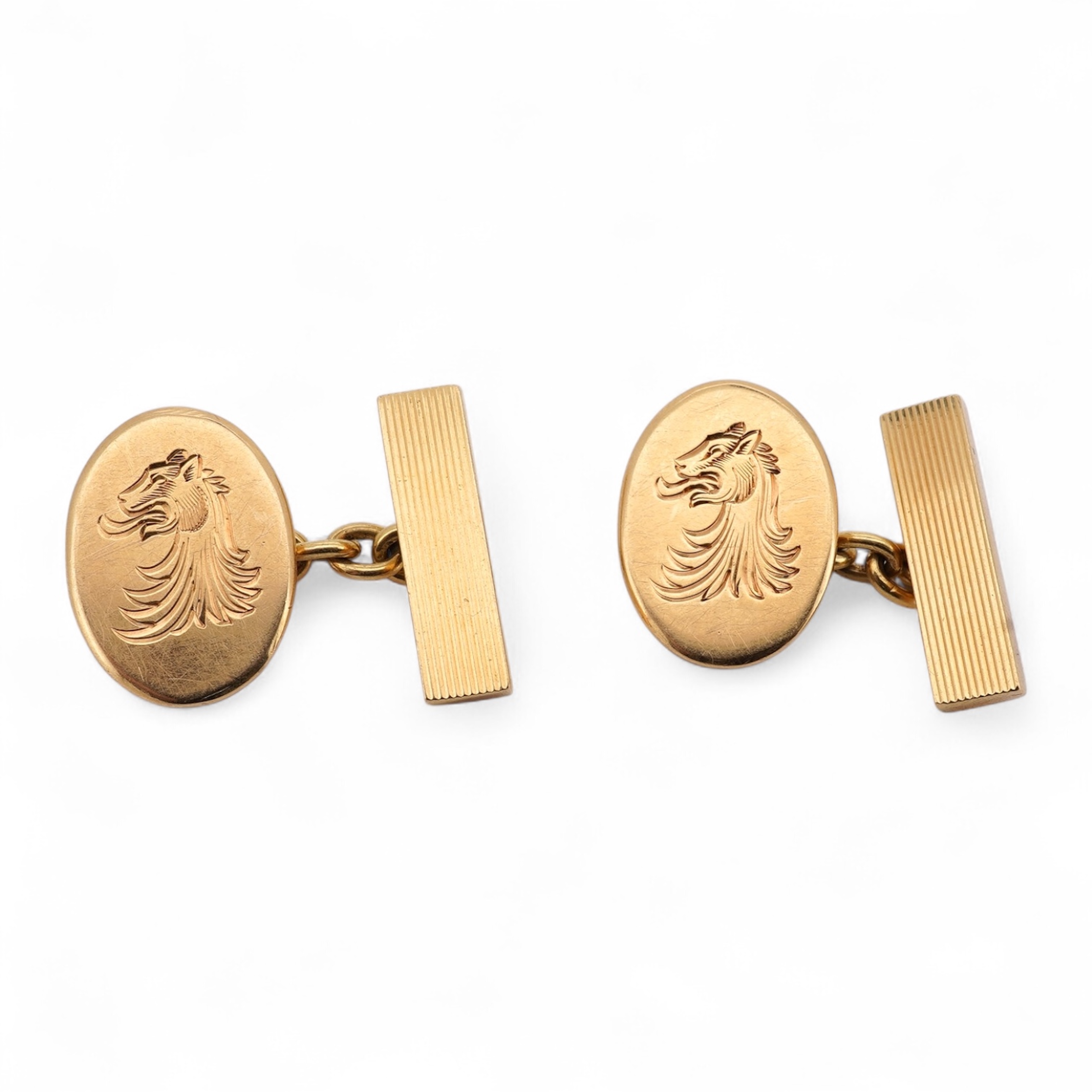A pair of Elizabeth II 18ct gold oval cufflinks, engraved with lion's head crest, S.J. Rose & Son, Birmingham, 1973, 22 grams. Condition - fair
